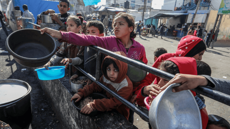 Is the world getting out of control? children in Gaza with empty pans seeking food
