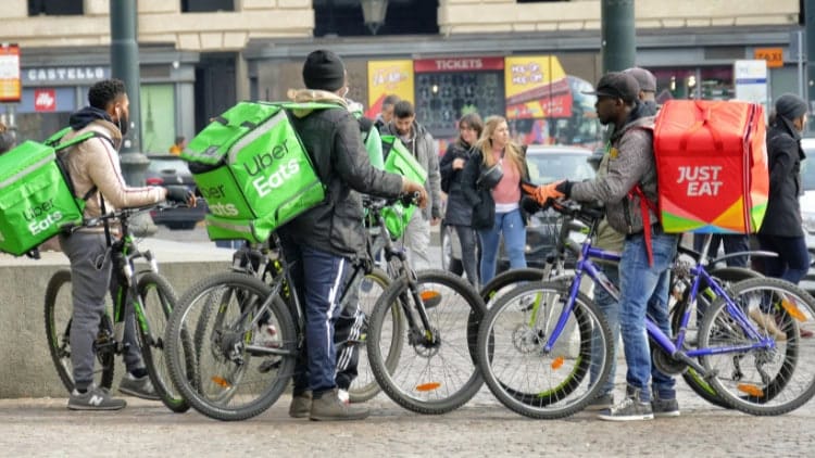 Migrant delivery riders