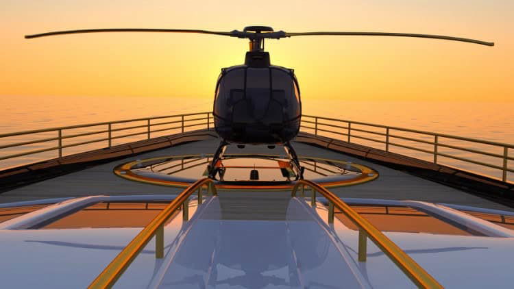 super yacht with helicopter