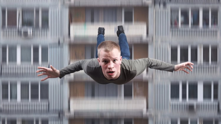 Will the young save Europe from the rise of the far right? Young man falling in front of an apartment block