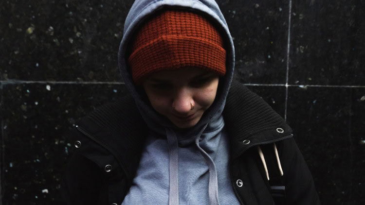 EPOCH-making?—the tool to end homelessness homeless girl with her head down and back to the wall