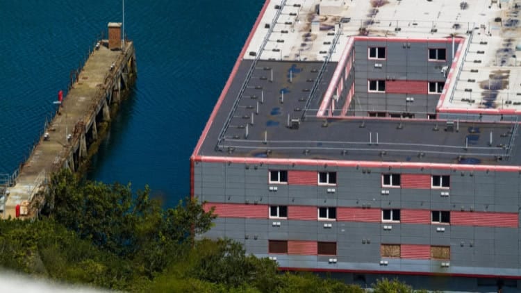 ‘Offshoring’ asylum—time to reject a disastrous model Floating barge next to port