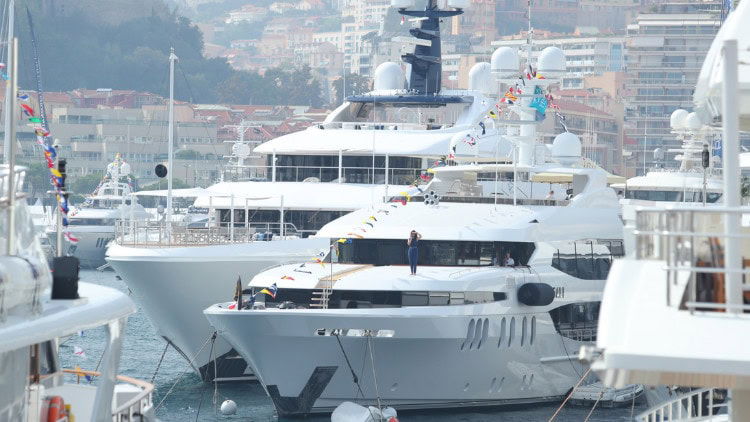 Tax on billionaires—political vaccine against the far right Super-yachts moored in Monaco's Port Hercule