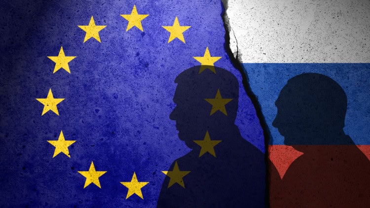 The conflicting missions of Viktor Orbán two shadowy figures, clearly Orban and Putin, against backdrop of EU and Russian flags
