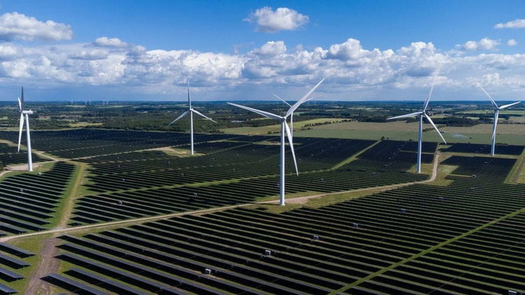 Fossil-fuel power in Europe: the only way is down Huge solar-panels array with wind turbines in between