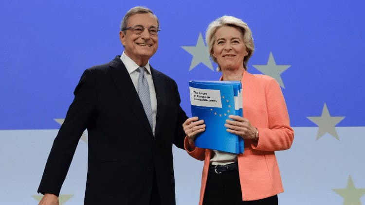 Smiling man and woman presenting report against backdrop of EU stars