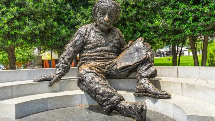 Kant, Einstein and ‘perpetual peace’ Statue of Einstein sitting reading a paper, reflecting soberly